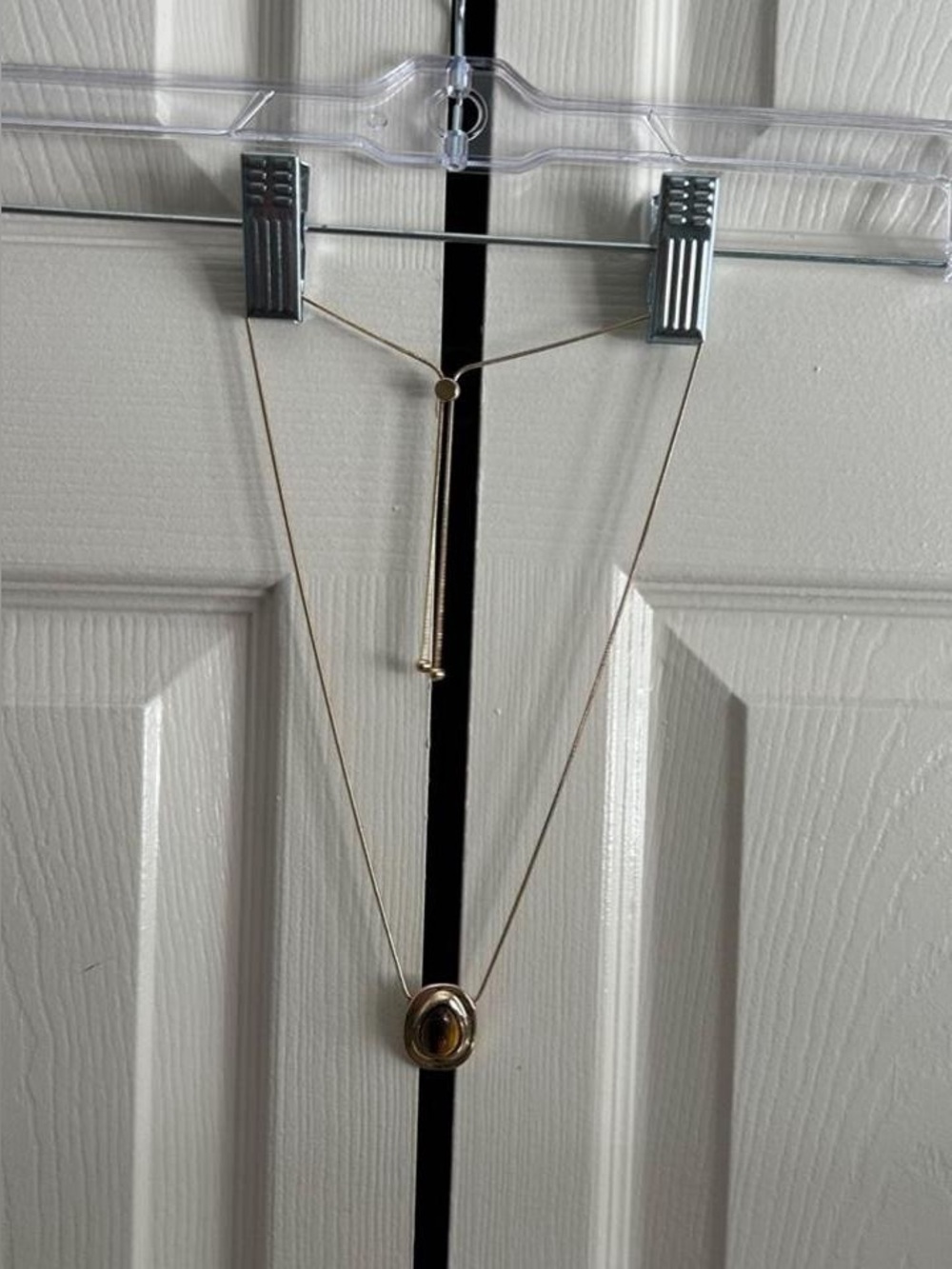 REVOLVE Gold Oval Pendant Necklace with Brown Center